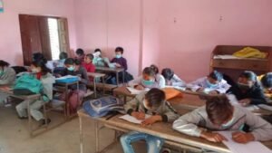 Nepali Student Taking written Exam in a school